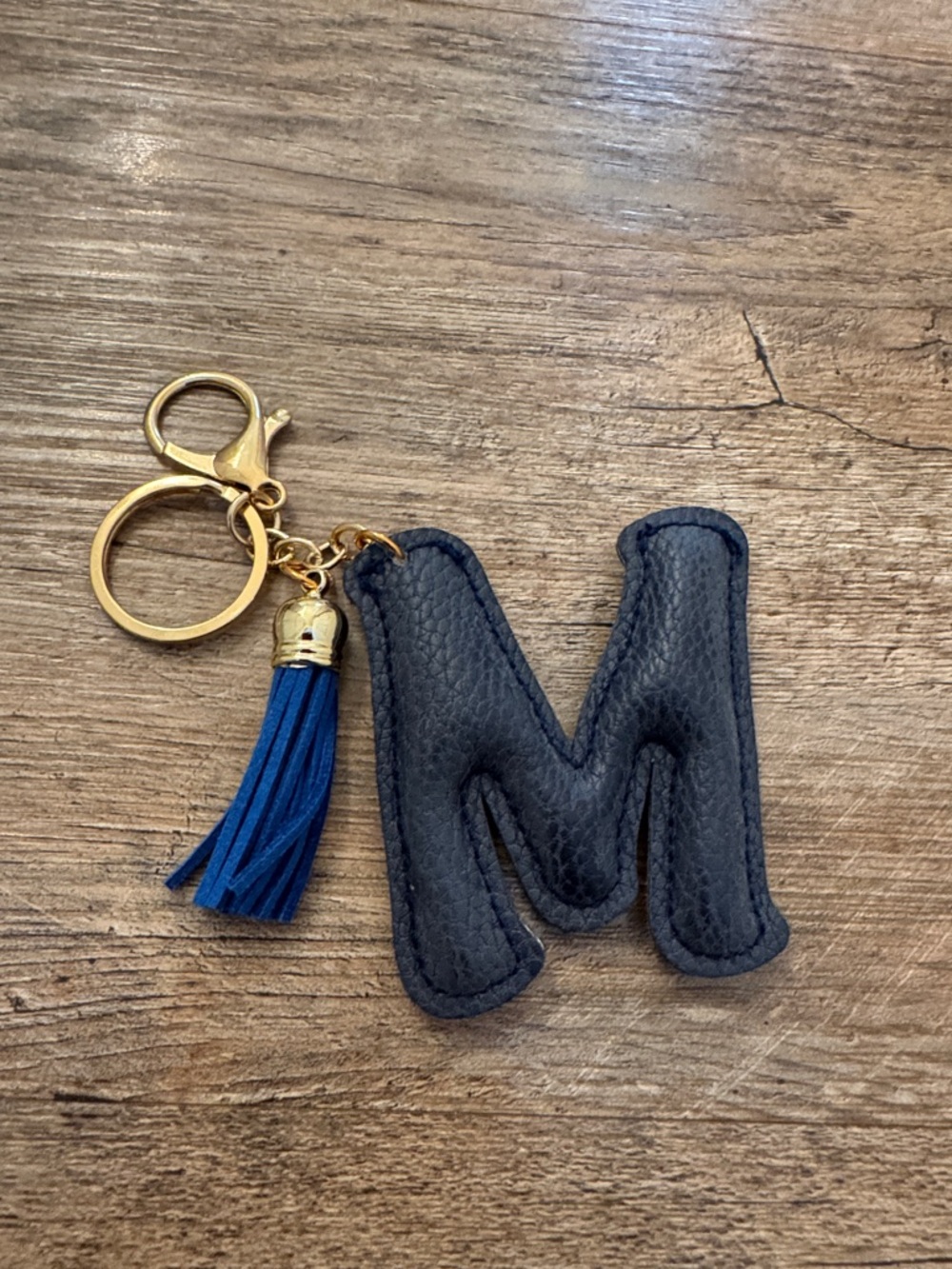 Expressions Black Monogram 'M' Keychain with Blue Tassel
